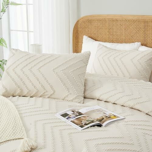 Cozy bed with textured pillows and open magazine.